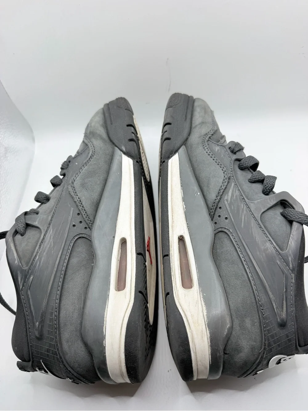 Jordan Kids Gray Sneakers with Red Swoosh